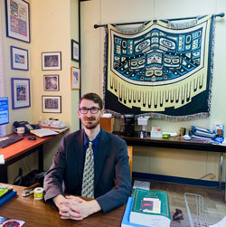 Alex Kramarczuk sitting at his desk